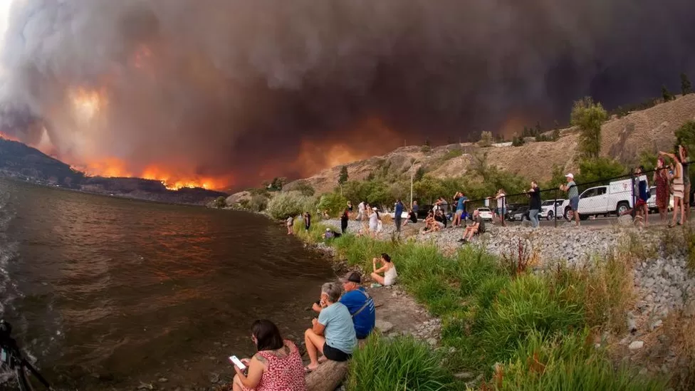 Wildfires engulf Canada homes as evacuation quickens